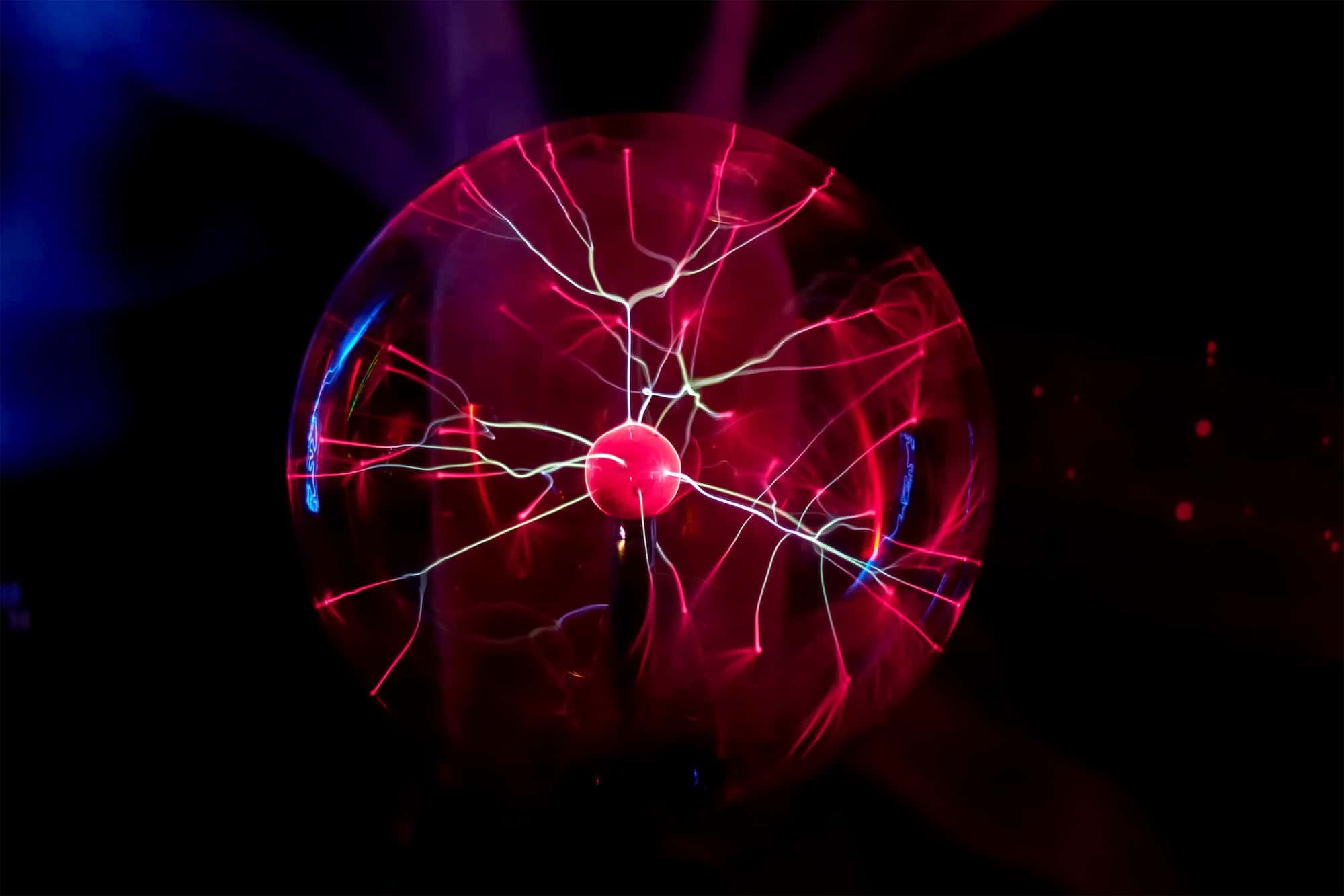 electric plasma ball on a dark background static electricity model